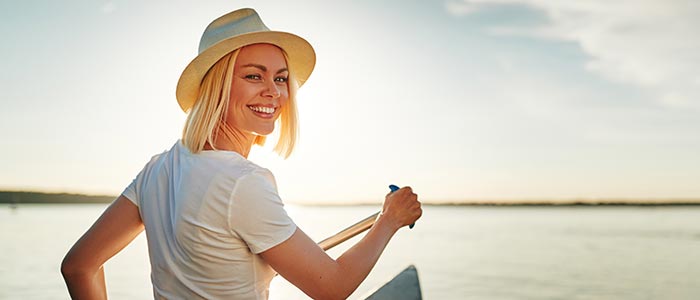 Chiropractic Charlotte NC Woman Smiling with hat on